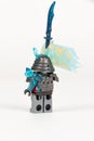 Toy hero general vex with a scimitar in armor from a set of lego ninjago on a white background