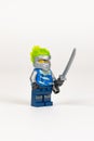 Toy hero Jay in a blue kimono with a sword from a set of lego ninjago on a white background. close-up. selective focus Royalty Free Stock Photo