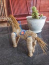 Toy horse statue made from vetiver plant.