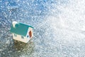 Toy house on ice Royalty Free Stock Photo