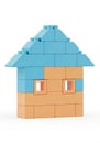 Toy house constructed from interlocking blocks in light blue and Royalty Free Stock Photo