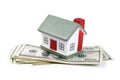 Toy house for dollar banknotes Royalty Free Stock Photo