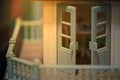 Toy house with door and veranda bar Royalty Free Stock Photo