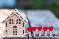 A toy house with a fence of hearts. Royalty Free Stock Photo