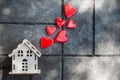 A toy house with a fence of hearts. Royalty Free Stock Photo