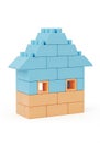 Toy house made of interlocking plastic bricks in blue and orange. Royalty Free Stock Photo