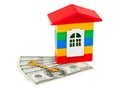 Toy house and money Royalty Free Stock Photo