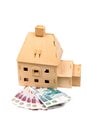 Toy house and money Royalty Free Stock Photo