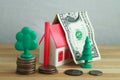 Toy house and money. Royalty Free Stock Photo