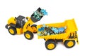 Toy loader and truck with puzzle Royalty Free Stock Photo