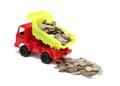 Toy lorry with coins Royalty Free Stock Photo