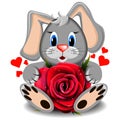 Toy love rabbit with realistic red rose