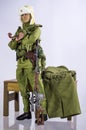 Toy man soldier action figure miniature realistic silk white and isolated background