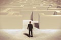 Toy miniature businessman figurine entering a  white maze structure Royalty Free Stock Photo