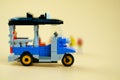 Toy miniature tuk-tuk or tricycle
