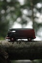 Toy Minibus on A Tree Trunk Royalty Free Stock Photo