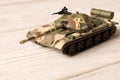 Toy model of the Soviet tank on a wooden table Royalty Free Stock Photo