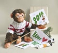 Toy monkey - painter Royalty Free Stock Photo