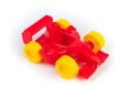 toy motor racing car, for children\'s fun and play, front closeup view, isolated on white background Royalty Free Stock Photo