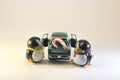 Toy Penguins Loading Candy Cane Onto Truck Royalty Free Stock Photo