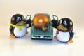 Toy Penguins Loading Xmas Ornament into Pickup Royalty Free Stock Photo