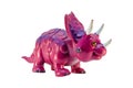 Toy pink dinosaur Triceratops plastic right view isolated