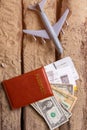 Toy plane and brown passport. Royalty Free Stock Photo