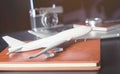 Toy plane on business office desk for business travel Royalty Free Stock Photo