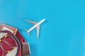 Toy plane is flying out of a travel backpacker Royalty Free Stock Photo