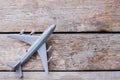 Toy plastic airplane on the old vintage table. Royalty Free Stock Photo