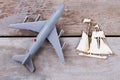 Toy plastic plane and flat wooden ship. Royalty Free Stock Photo