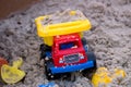 Toy Plastic Truck in the Sand Royalty Free Stock Photo