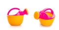 Toy plastic watering can Royalty Free Stock Photo