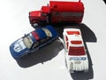 Toy police vehicles on white background