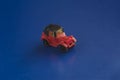 Toy red and black car racing down the imaginary road Royalty Free Stock Photo