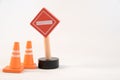 Toy road sign and traffic cones Royalty Free Stock Photo