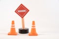 Toy road sign and traffic cones Royalty Free Stock Photo