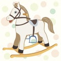 Toy rocking horse for a child on the delicate cheerful background