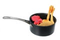 Toy Rubber Chicken in Saucepan Royalty Free Stock Photo