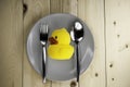 Toy rubber duck on a plate Royalty Free Stock Photo