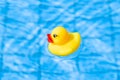 Toy Rubber Duck. Yellow Inflatable Plastic Toy For Kids Swim In Blue Water Of Summer Pool. Hello Summer Concept