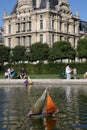 Toy Sailboat in pond, Lourve, Jardin Paris, France