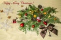 Toy Santa Claus,chocolate balls and hearts,cones and Happy Merry Christmas on the branch of a cypress tree Royalty Free Stock Photo