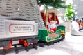 Toy Santa Claus on Polar Express Train on bright white Christmas eve Royalty Free Stock Photo