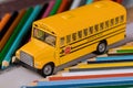 Toy school bus with color wooden pencils Royalty Free Stock Photo