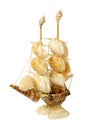 Toy ship isolated on a white background. Handicraft from sea shells. Royalty Free Stock Photo