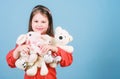 Toy shop. childrens day. Best friend. little girl playing game in playroom. happy childhood. Birthday. hugging a teddy Royalty Free Stock Photo