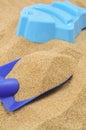 Toy shovel and sand mould Royalty Free Stock Photo