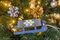 Toy sleigh on christmas tree vackground, winter mood Royalty Free Stock Photo