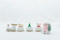 Toy snowman near the wooden white christmas train on the white background Royalty Free Stock Photo